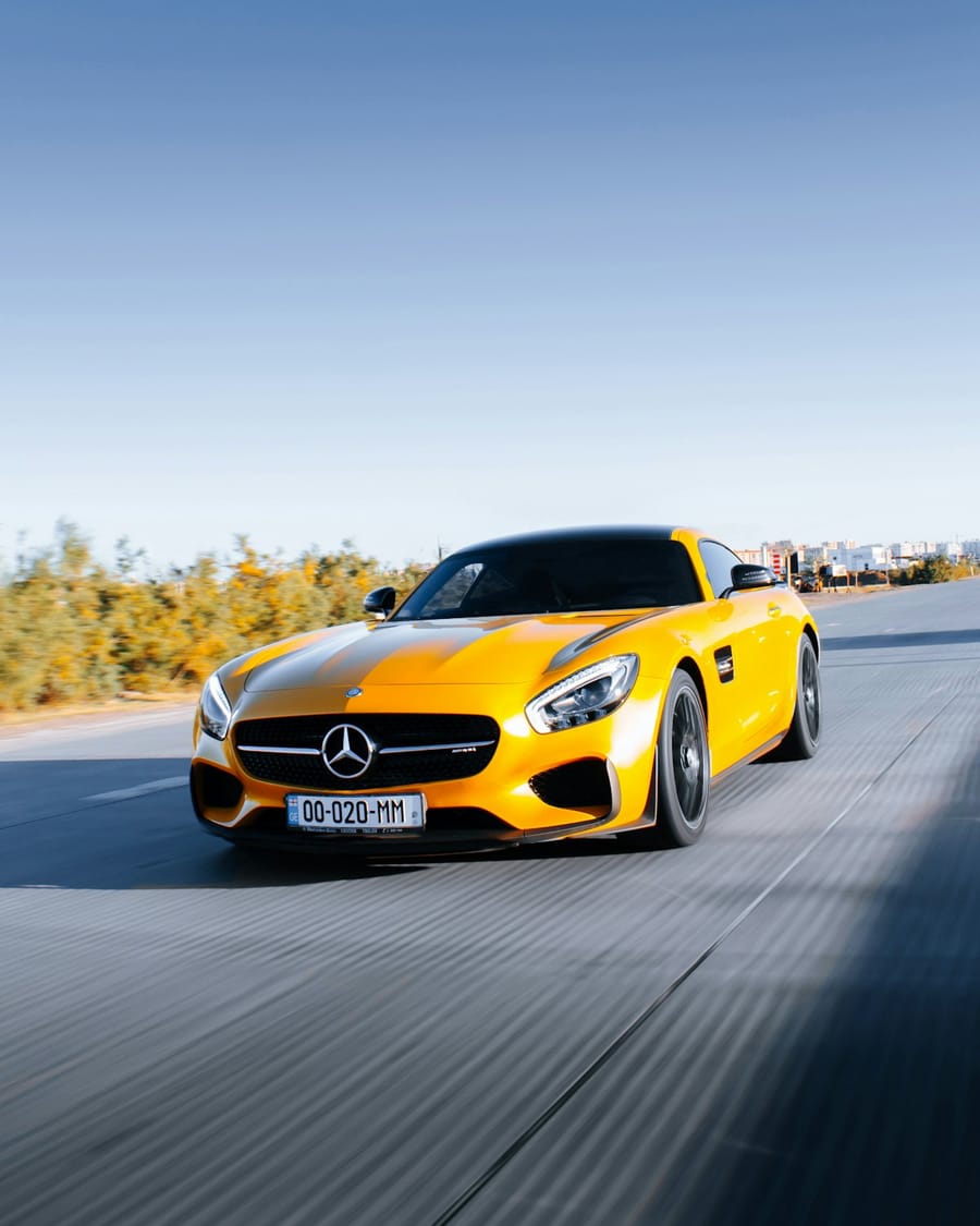 Luxury sports car shipped in fully enclosed transport